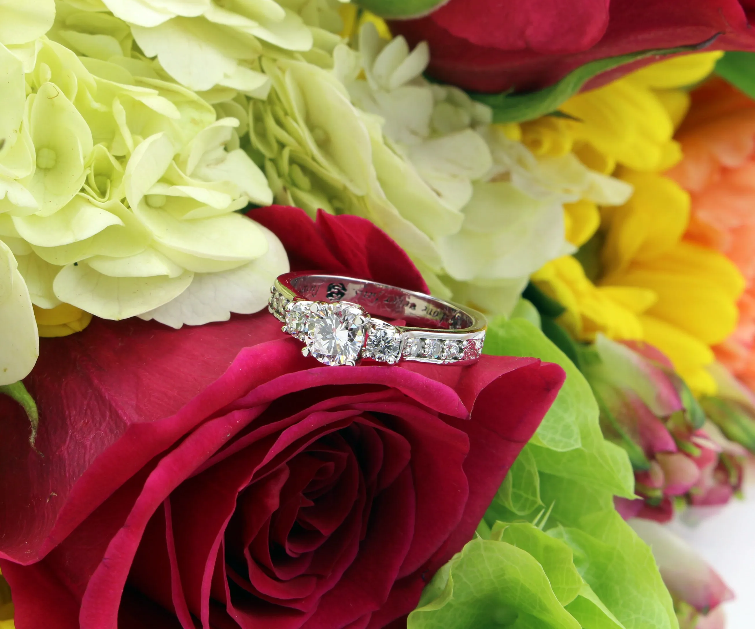 Three Stone Rose Engraved Diamond Ring