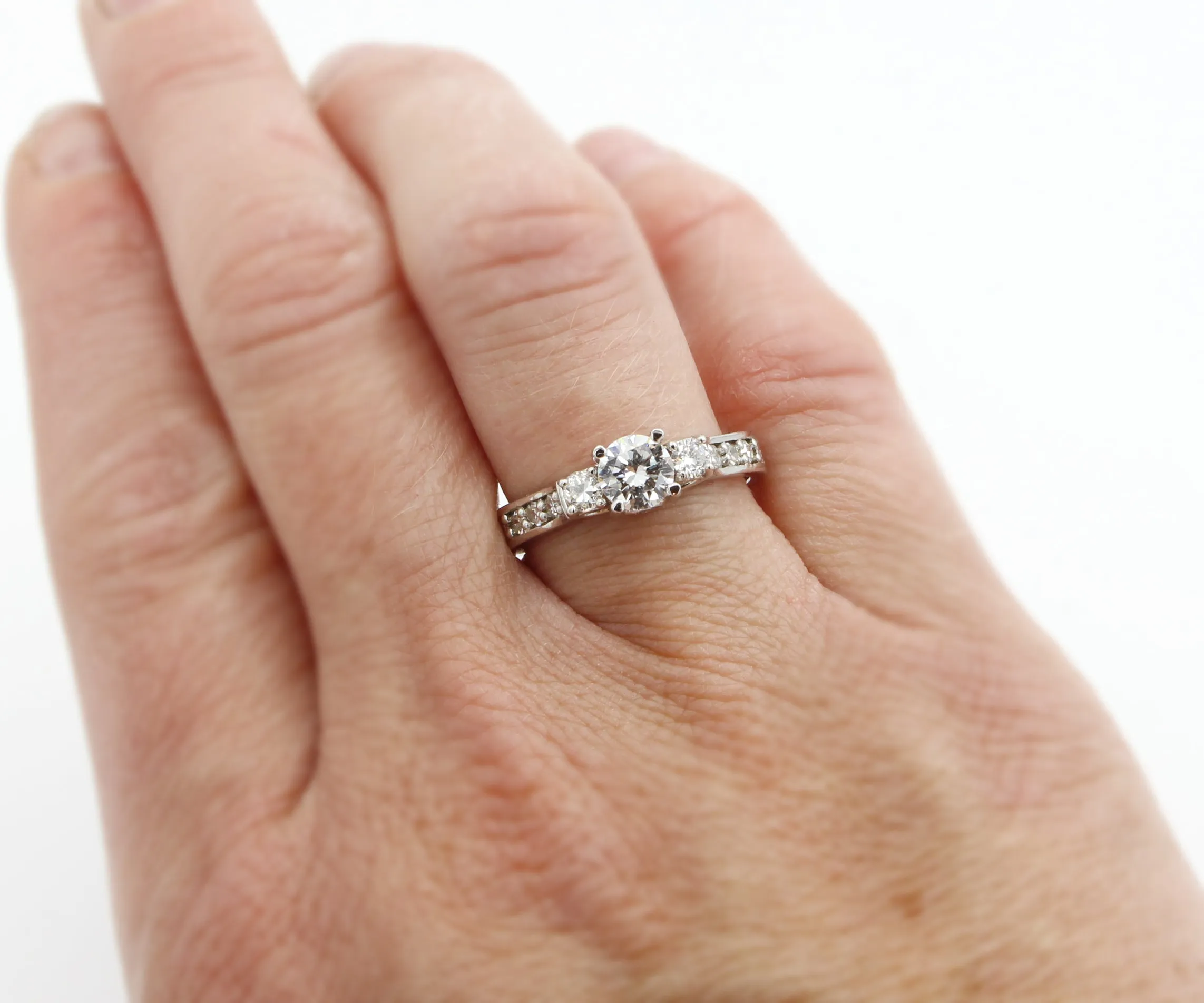 Three Stone Rose Engraved Diamond Ring